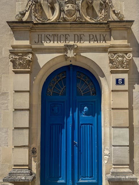 Historical ornate building with Justice de Paix inscription